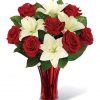 xquisite White Lily and Red Rose Flower Arrangement: A Captivating Expression of Love and Elegance in a Red Cylinder Vase"